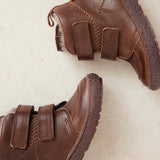 A pair of bisgaard storm lamb coffee boots with warm, cozy lining