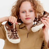 Brown leather bisgaard zion shoes with cacao-colored accents and laces