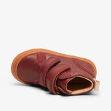 Close-up of bisgaard cuba rhubarb shoes showing high-quality leather and vibrant red color